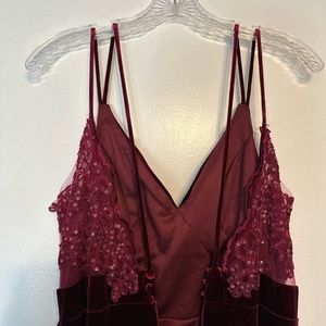 Maroon floor length women’s down. Great as a bridesmaid dress. Never worn.